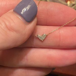 Kendra Scott 14k rose gold and white diamond necklace.